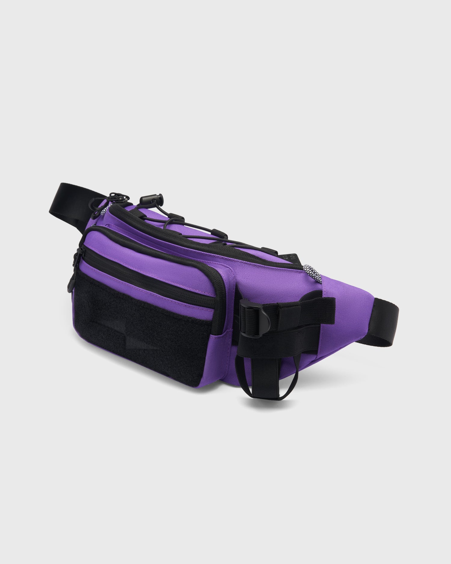 Sacoche OMNI PACK BELT BAG AVNIER violet, vue de profil, format 1,5L avec porte-gourde ajustable et attaches techniques latérales. - violet