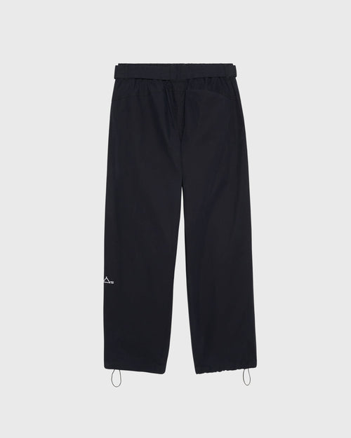 Pantalon Housaka AVNIER × Saint James noir, vue de dos, coupe oversize avec poche arrière sous rabat et broderie Mont sur la jambe gauche.